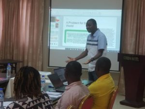 Alvin Winford, the Program Manager at the African Network for the Prevention and Protection Against Child Abuse (ANPPCAN) presents to 30 members of the Liberian Child Rights NGOs Coalition_2