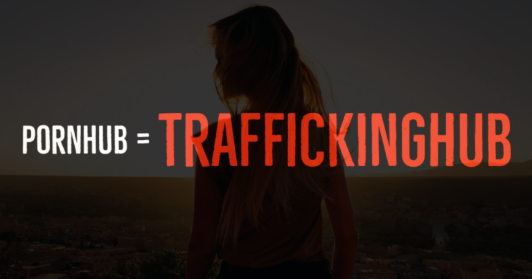 Pornhub = #TraffickingHub superimposed over an image of a woman standing outside