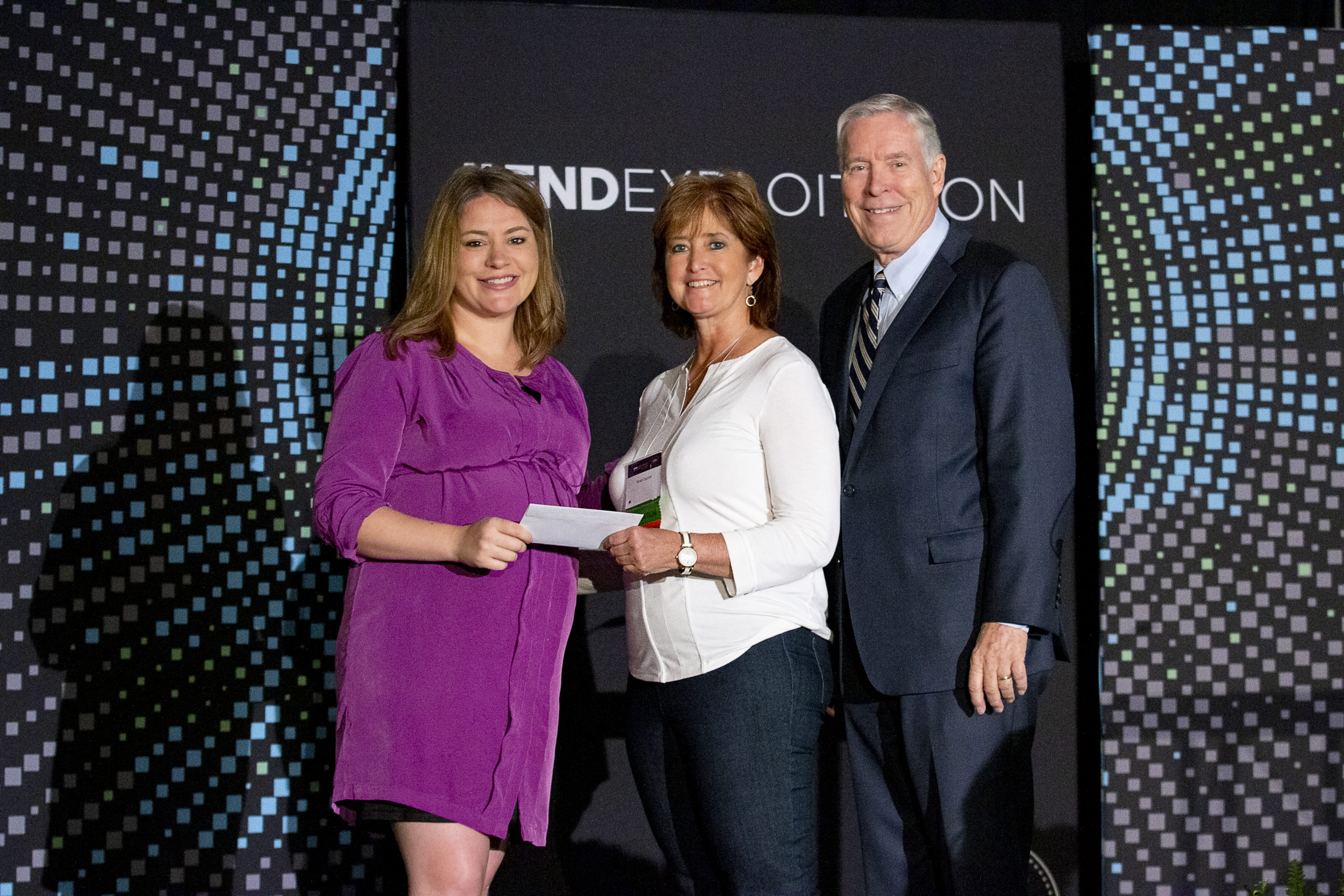 Walk Her Home Founder & President presenting the donation to the National Center on Sexual Exploitation at the 2019 Coalition to End Sexual Exploitation Global Summit. 