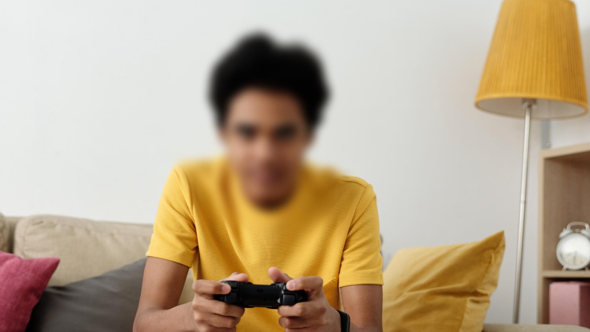 Young teen boy with his face blurred